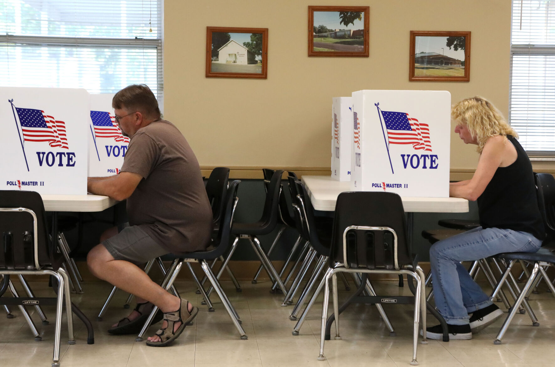 Bob Kopp and Linda Struttmann vote